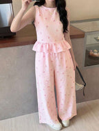 Conjunto de niña Líneas y Moños rosa